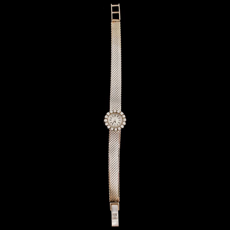 DAMARMBANDSUR, 18k vitguld, 16 briljantslipade diamanter, Certina, Schweiz, omkring 1900-talets mitt. Vikt 24 g.