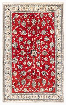 A carpet, Nain, approx. 256 x 158 cm.