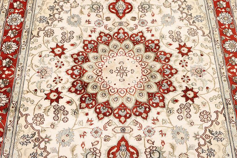 A carpet, Turkey, silk, c. 180 x 120 cm.
