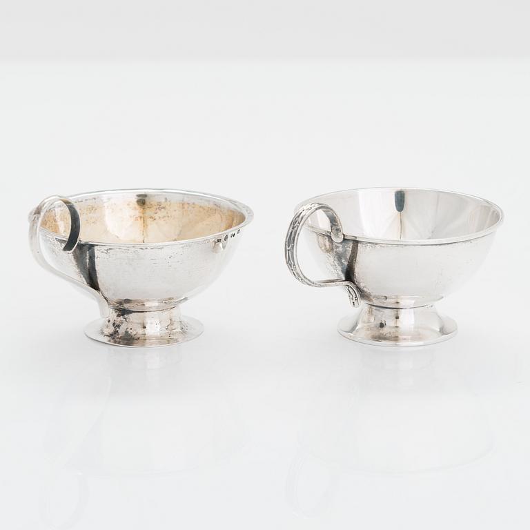Two sterling silver bowls, Gustav Jansson 1955, 1960, and eight similar silver punsch cups, GAB and CGH 1933-41. Sweden.