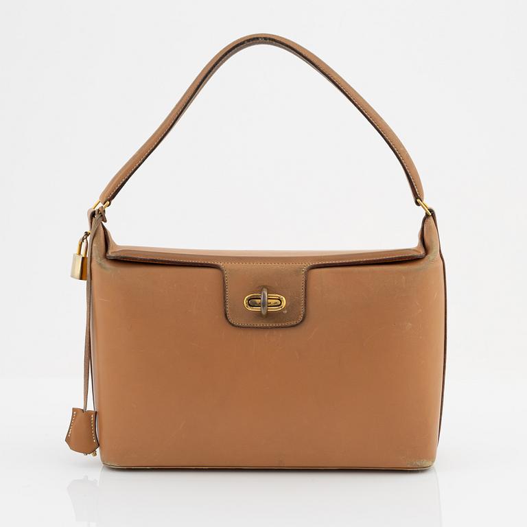 Hermès, a vintage tan leather bag, mid 20th century.