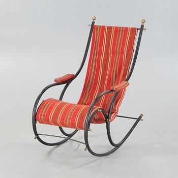 A 19th century rocking chair, probably Robert W. Winfield.