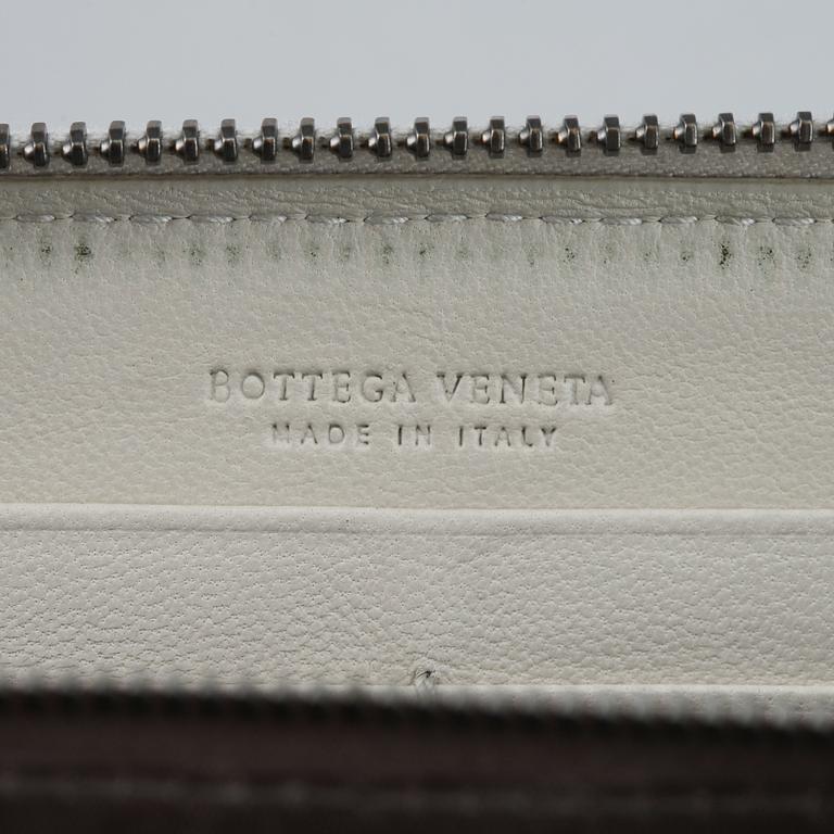 BOTTEGA VENETA, a intrecciato leather wallet.