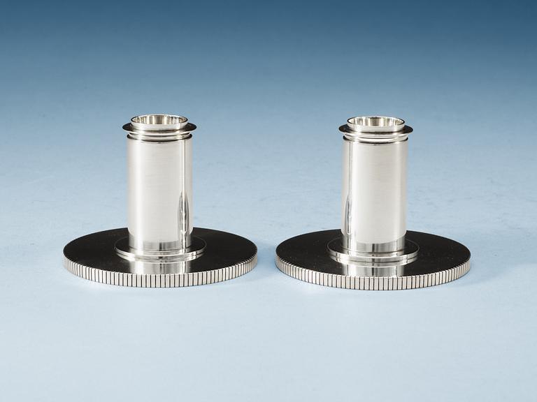 A pair of sterling Sigvard Bernadotte candlesticks.