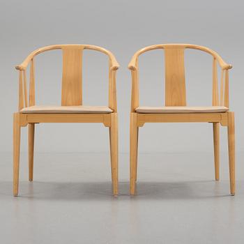 A pair of Hans J Wegner 'China' chairs, Fritz Hansen, Denmark 1987.