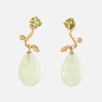 Earrings with pear-shaped prehnite, peridot, and brilliant-cut diamonds.