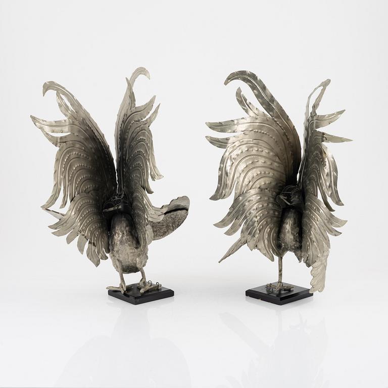 A pair of metal table decorations, 20th century.