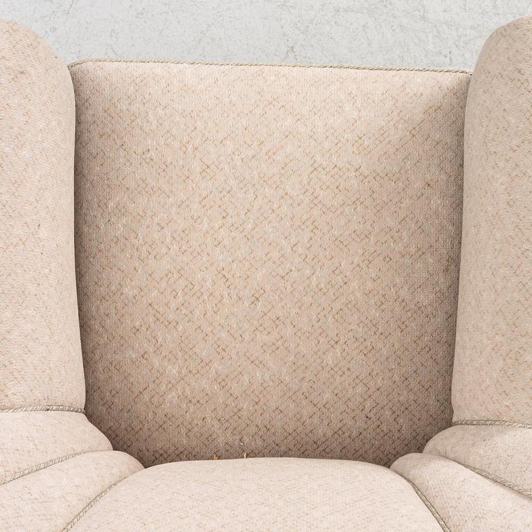 A pair of Swedish modern armchairs, first half of the 20th century.