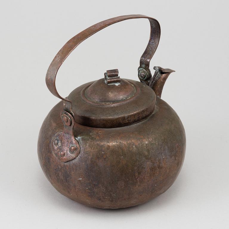 An 18th century copper coffee pan.