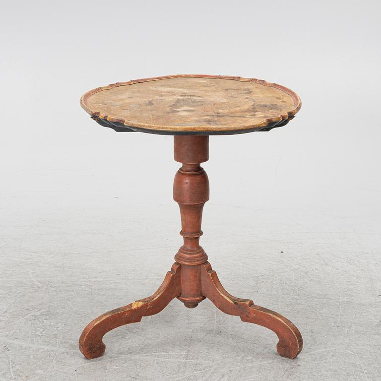 A folding table, 19th century.