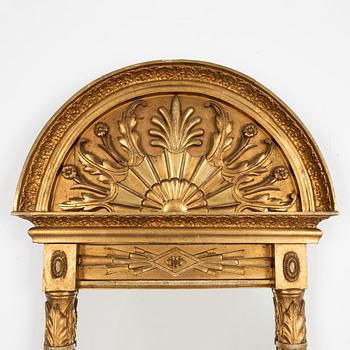 An Empire mirrot, first half of the 19th century.