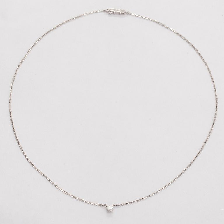 Cartier, an 18K white gold '1895' necklace with a brilliant-cut diamond.