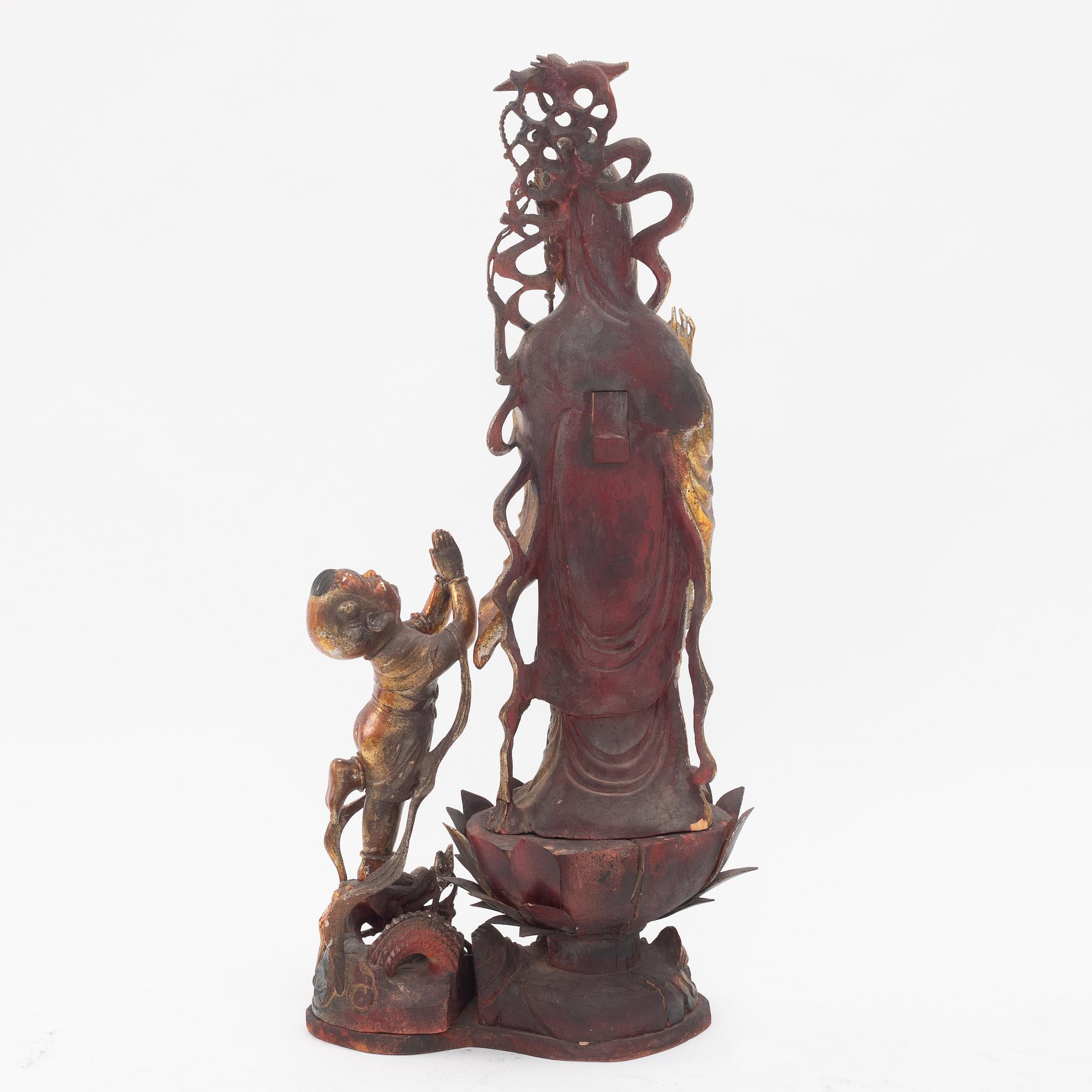 A large gilt and lacquer sculpture group, three parts, 20th century.