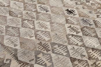 A Kilim carpet, ca 250 x 174 cm.