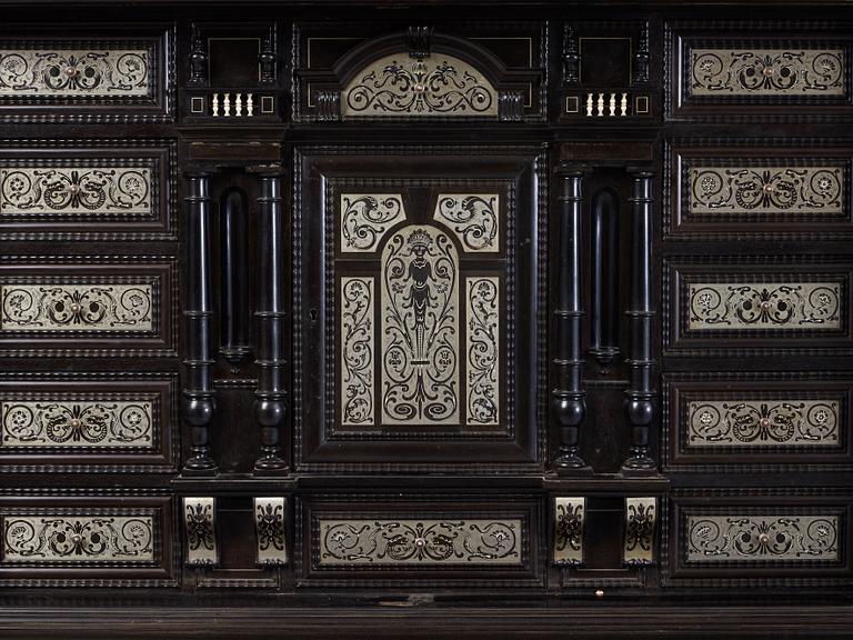 A Baroque-style circa 1900 cabinet on stand.