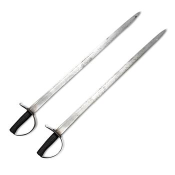 Two 19th century naval cutlasses.