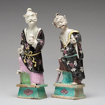 A pair of famille rose figures of 'Immortals', Qing dynasty, late 18th Century.