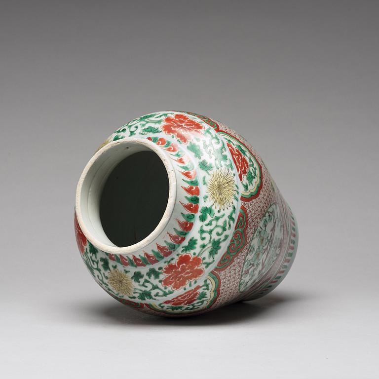 A Transitional wucai baluster vase with cover, 17th Century.