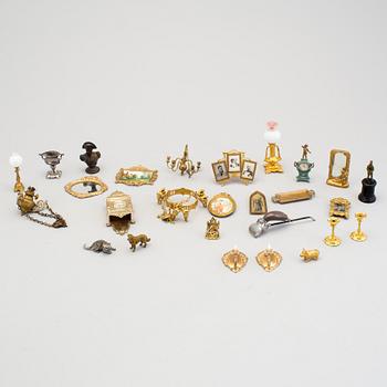 A lof of fifty pieces of dollhouse furniture and accessories, 19/20th century.