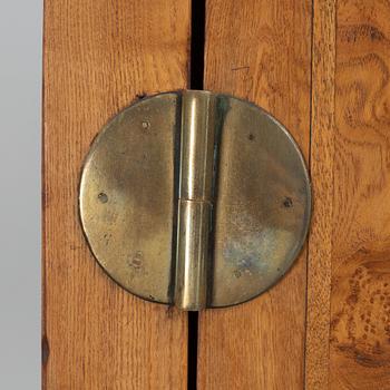 A Chinese hardwood two-part cabinet, 20th century.