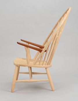 A Hans J Wegner ash and teak 'Peacock chair', by PP Møbler, Denmark.