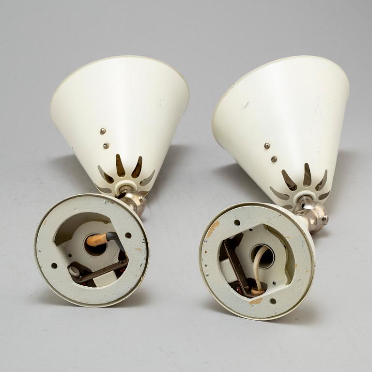 A pair of Asea wall lamps.