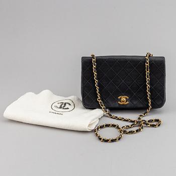 Chanel, a quilted leather 'Flap' bag, 1989-91.
