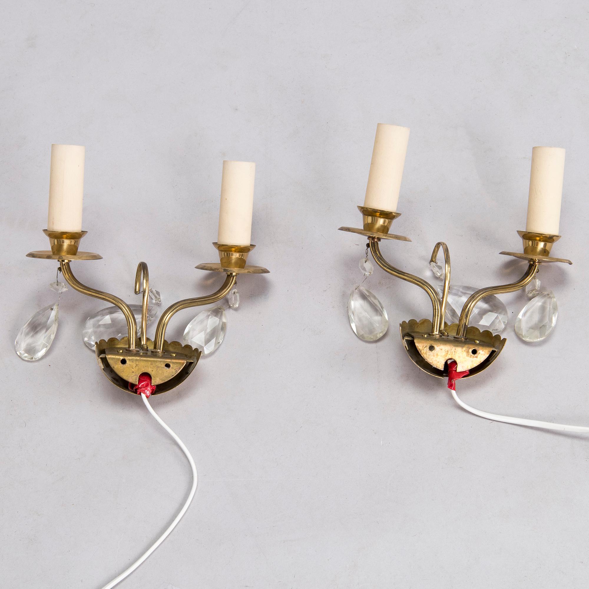 Four of mid-20th century wall sconces.