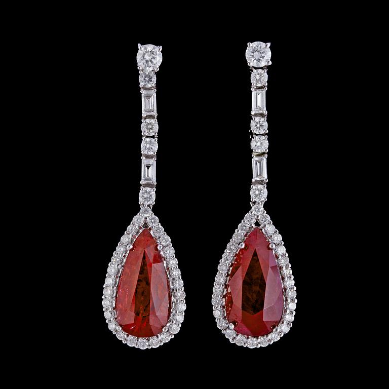 A pair of drop cut rubies, tot. 7.45 cts, and brilliant cut diamond earrings, tot. 1.33 ct.