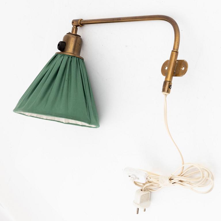 Josef Frank,  a wall/ bed light, brass,  Firma Svenskt Tenn.