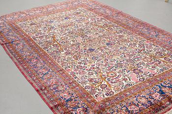 A carpet, a semi-antique silk Kashan, ca 317 x 207-210,5 cm.