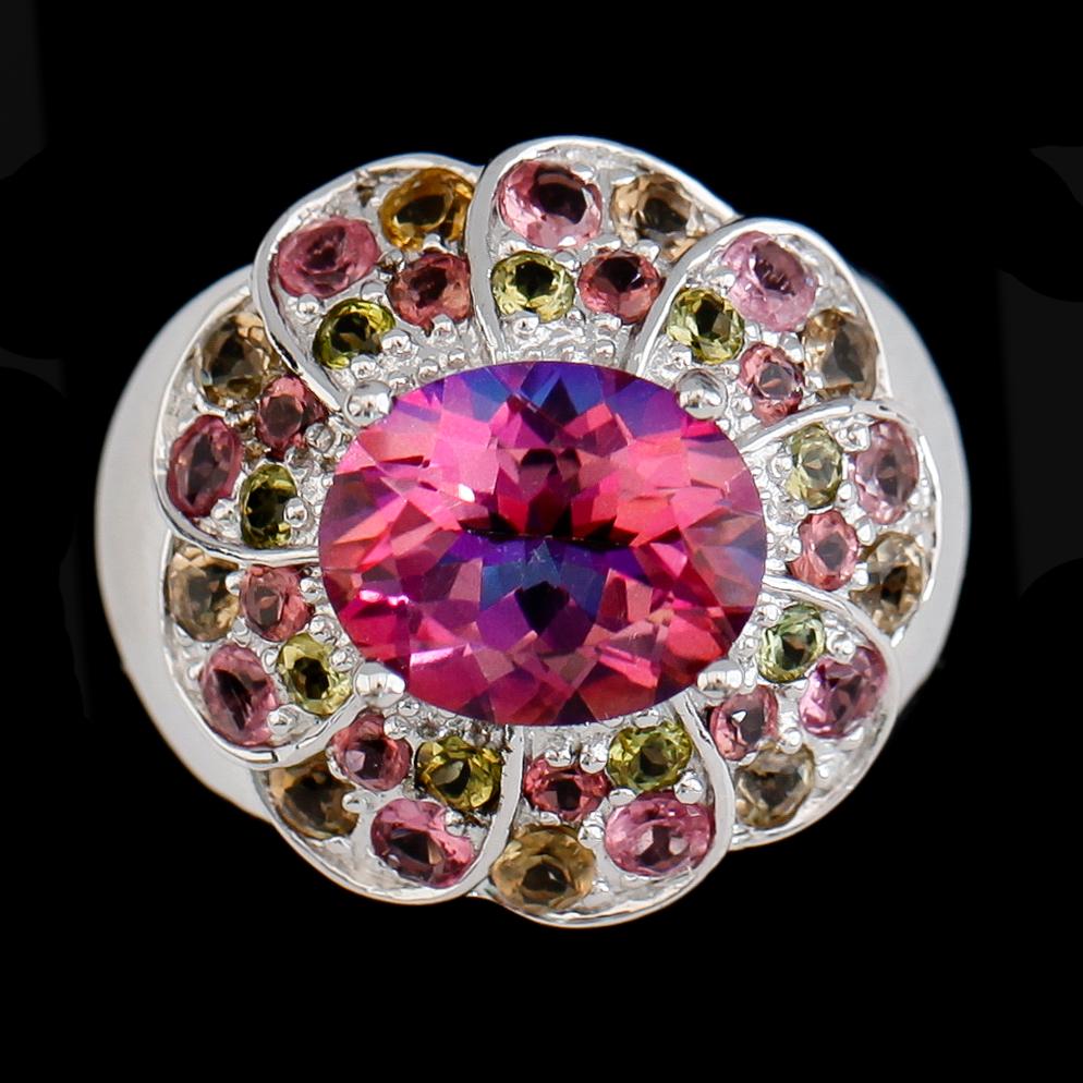 RING, sterlingsilver, färgad rosatonad topas ca 3.50 ct och olikfärgade tumaliner tot ca 3.00 ct.