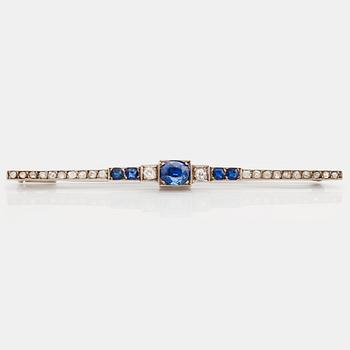 796. A brooch set with sapphires, old- and rose cut diamonds.