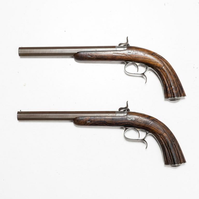 A cased pair of percussion pistols by Pondevaux & Jussy, S.Etienne (1845-1880), France.