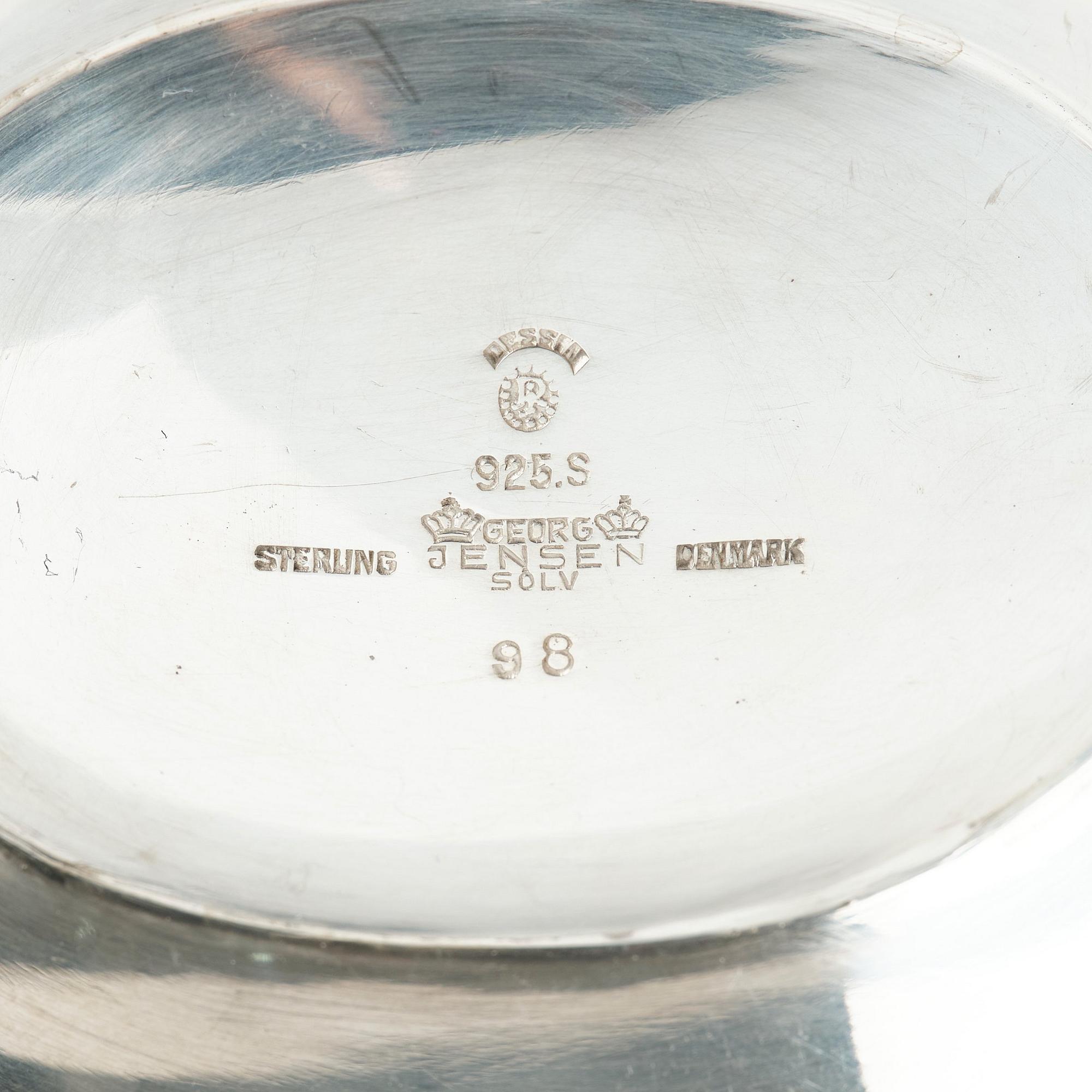 Georg Jensen, a sterling silver sauceboat and ladle, Copenhagen 1925-1945, design nr 98 and 141.