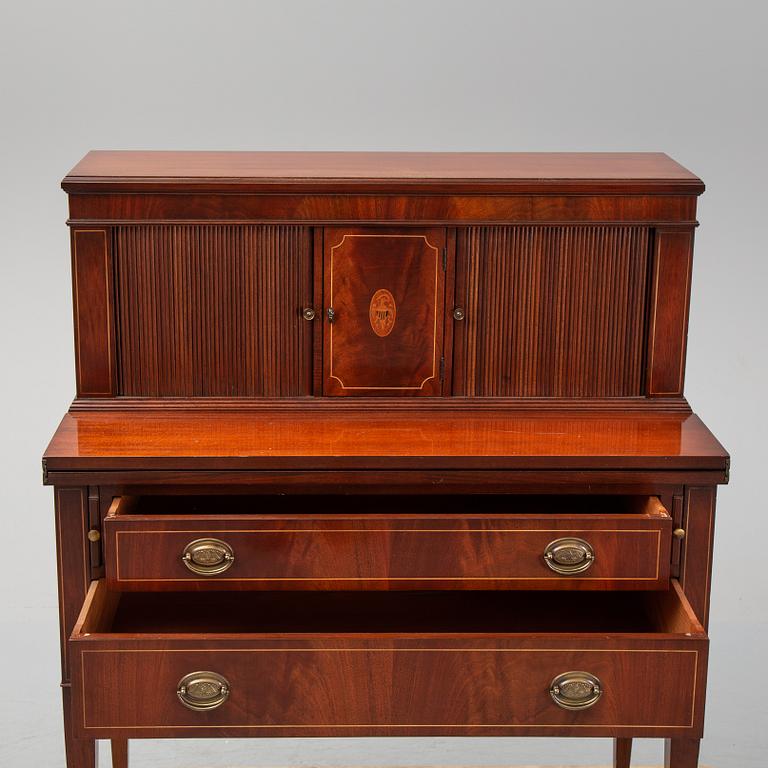 A gustavian style secretaire from the mid 20th century.