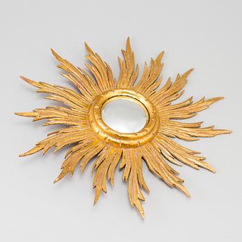 A mirror in shape of a sun, second half of the 20th century.