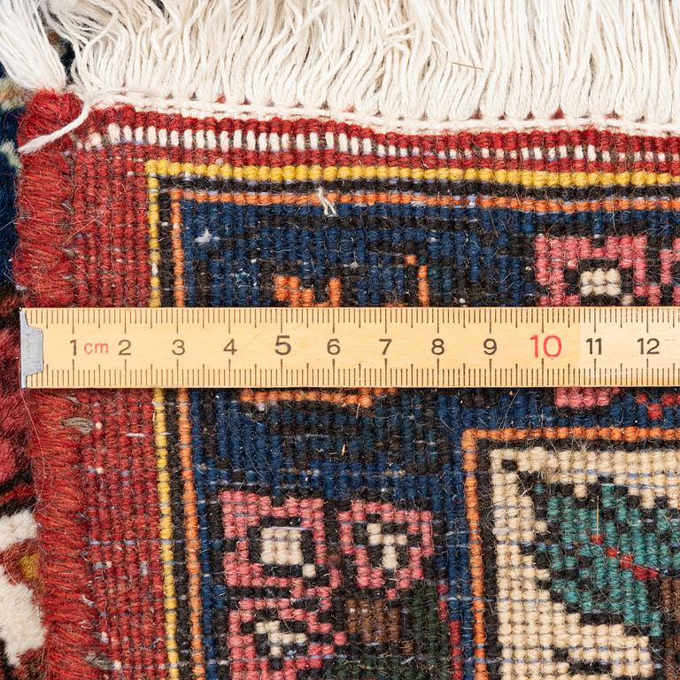 A Bakhtiari carpet, c. 307 x 207 cm.