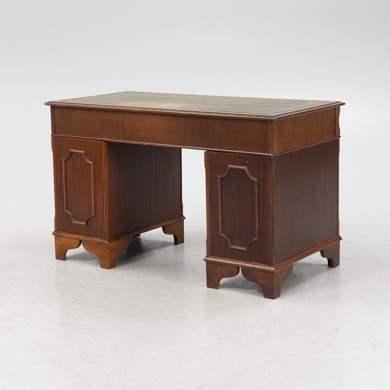 An English style mahogany desk, second half of the 20th Century.