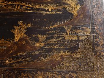 A Chinese painted black lacquer low table, Qing dynasty.