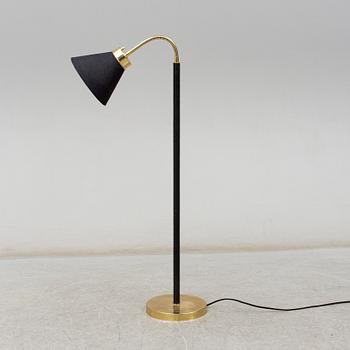 JOSEF FRANK, a brass and leather wrapped floor lamp, model 1838, from Firma Svenskt Tenn.