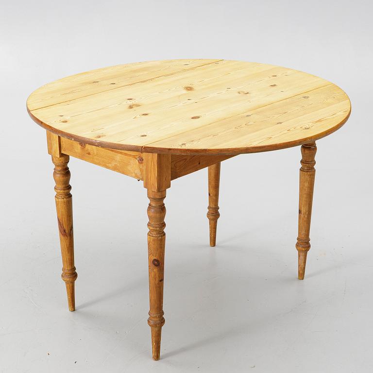 A folding table, early 20th Century.