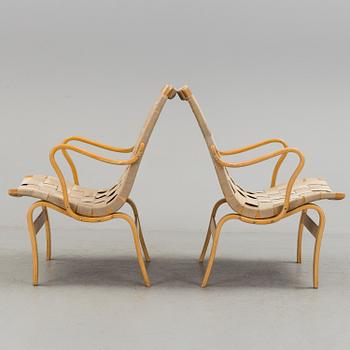 A pair of 'Eva' beech armchairs from Firma Karl Mathsson, Värnamo, 1968.