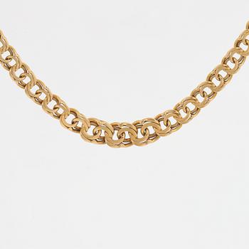 18K gold necklace.