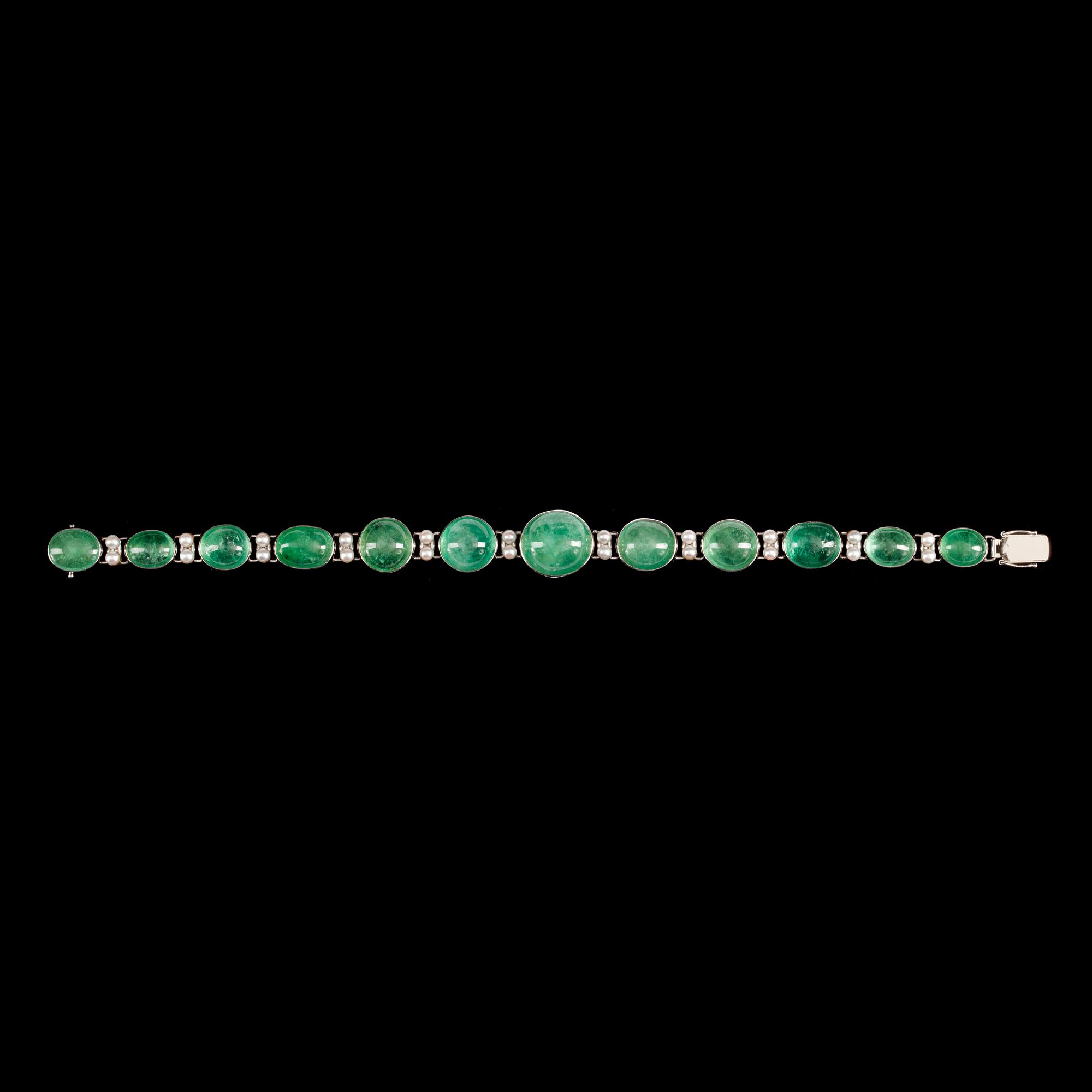 A cultured pearl and cabochon-cut green beryl bracelet.