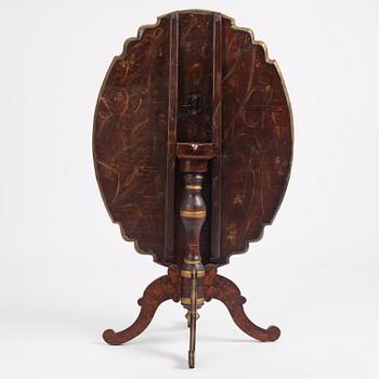 A Swedish late-Baroque polychrome-painted tilt-top table, first part 18th century.