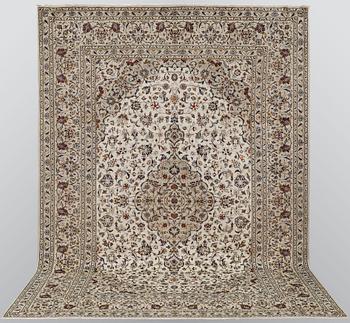 A carpet, Kashan, ca 385 x 245 cm.