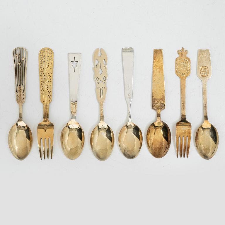 Anton Michelsen, Annual/Christmas cutlery, 8 pieces, gilt sterling silver and enamel, Denmark, 1930s–40s.