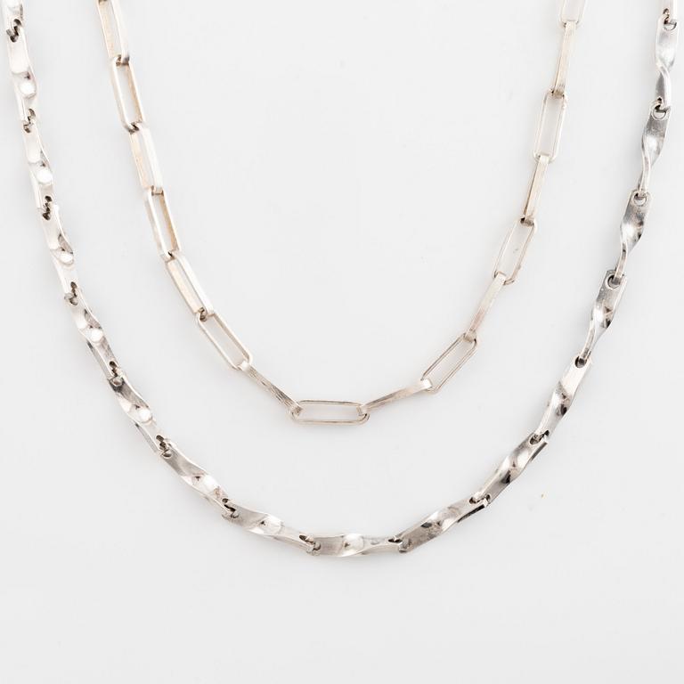 Rey Urban, two silver necklaces.