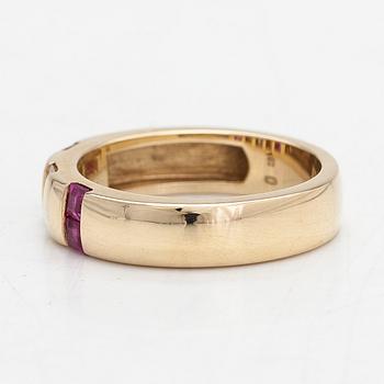 Ring, 14K guld med diamanter ca 0.012 ct tot och rubiner.